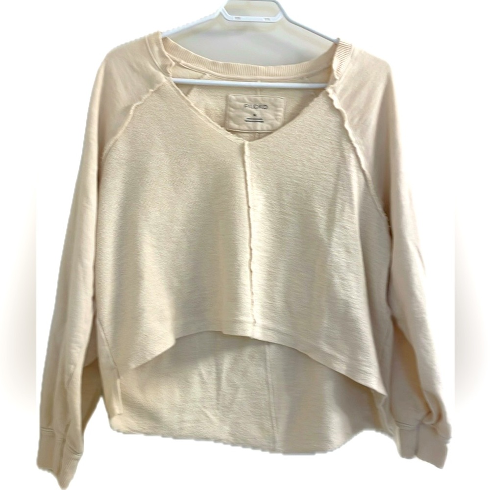 Anthropologie PIlcro Cream Cotton  Hi- low sweatshirt with Frayed V-neck.